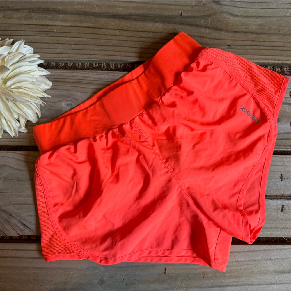 LN-Reebok neon orange play dry short  4/16$